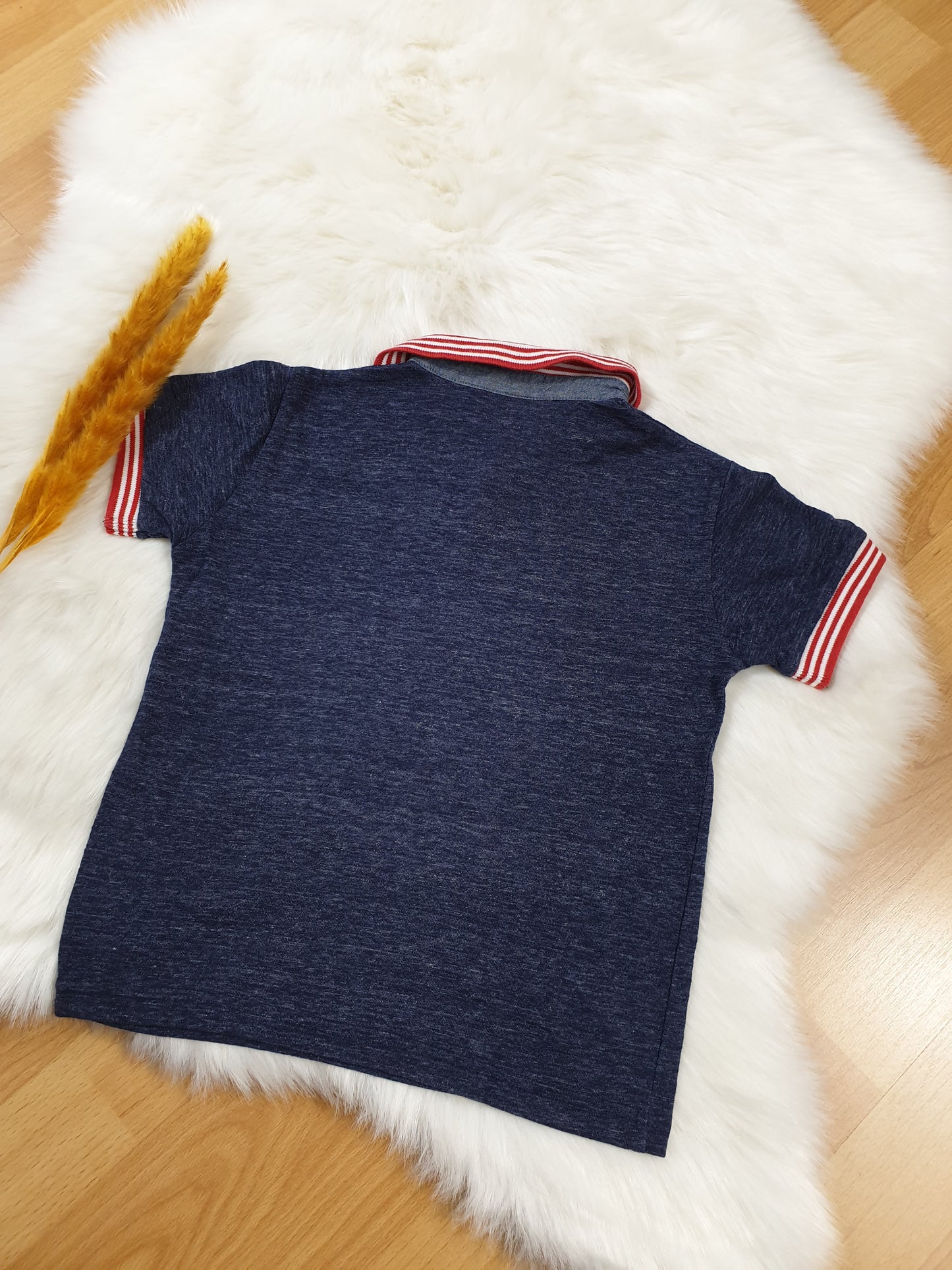 Neuwertiges blau meliertes Poloshirt „Next“ | Größe 98/104 (3-4 Jahre)